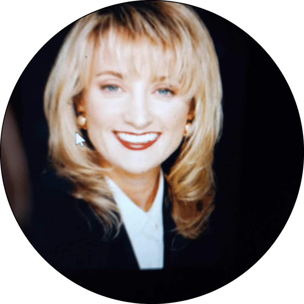 Our Team 27 Laurie Wallace, smiling professional headshot, showcasing her dynamic background in sales and business management, emphasizing strong communication skills relevant to United Construction Group Hawaii.